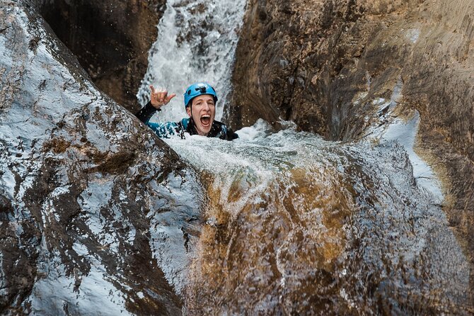 Adrenaline Canyoning Tour - Water features: jumps and slides you can trade for rappelling