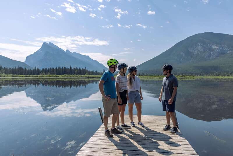 Banff: Mountain Lakeside Guided E-Bike Tour - Lake Minnewanka: The Flooded Town and the 50-Foot Detail