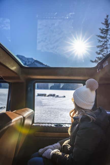 Banff: Winter Tour with Dinner & Nightrise at Banff Gondola - Entering the Banff Winter Tour: Open-Top Vintage Car and Photo-Stop Rhythm