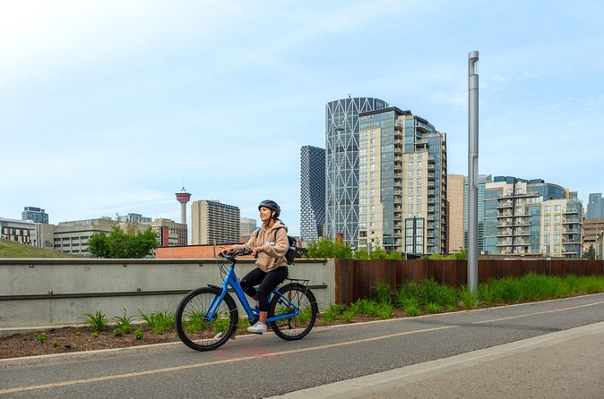 Calgary #1 Food Bike Tour: Taste Local And See The City By E-Bike - Stampede grounds, Calgary Tower views, and the logic of the cycling