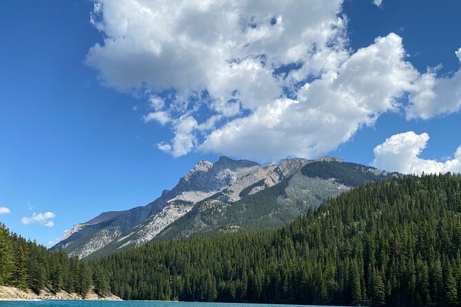 Moraine Lake & Louise & Banff Day Tour From Calgary-Canmore-Banff - Bow Falls: A Misty Finale Before the Drive Back