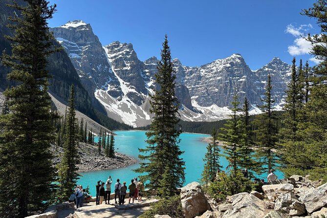Moraine Lake & Louise & Banff Day Tour From Calgary-Canmore-Banff - Lake Louise: Turquoise Summer Water and Winter Ice-Skating Magic