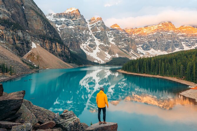 Moraine Lake Sunrise: Premium Tour from Canmore & Banff - Rockpile stop before sunrise: hot drinks and early angles